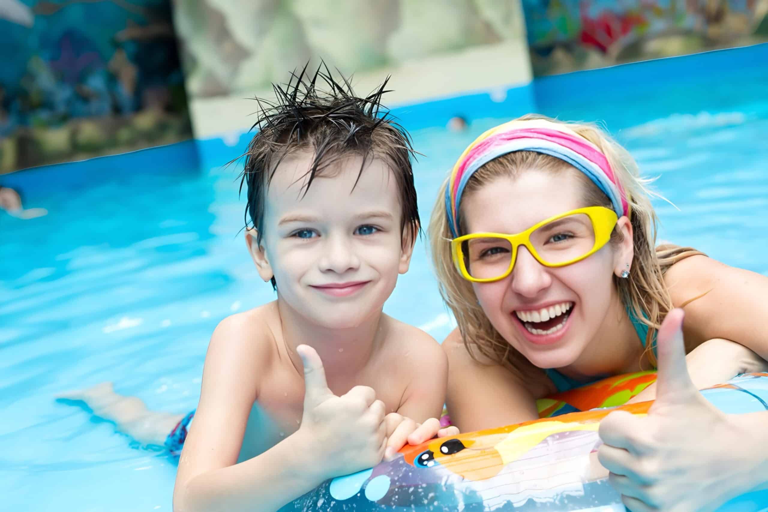 Boy and girl in waterpark pool, fundraising ideas, charity ideas, silent auction items, travel fundraising events