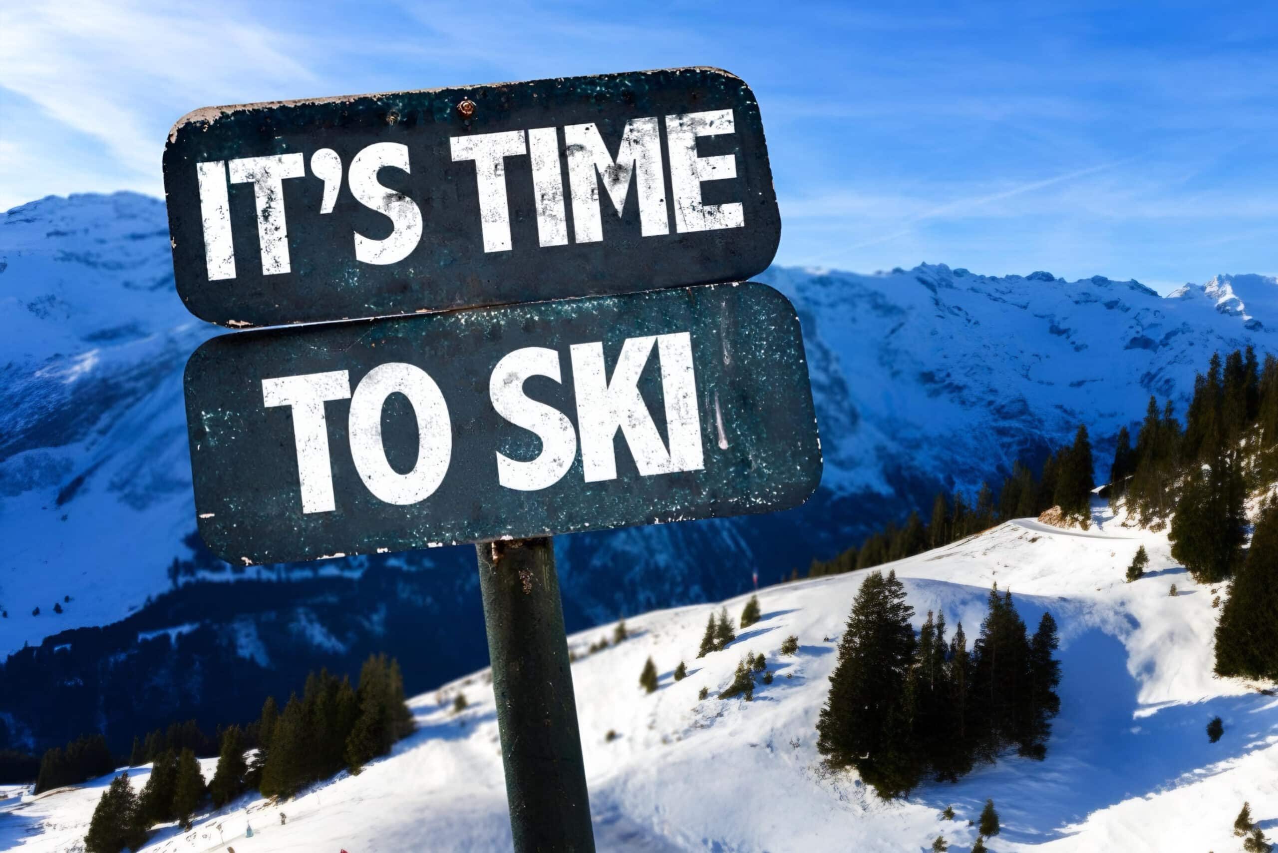 sign in mountains saying it's time to ski, fundraising ideas, charity ideas, silent auction items, travel fundraising events