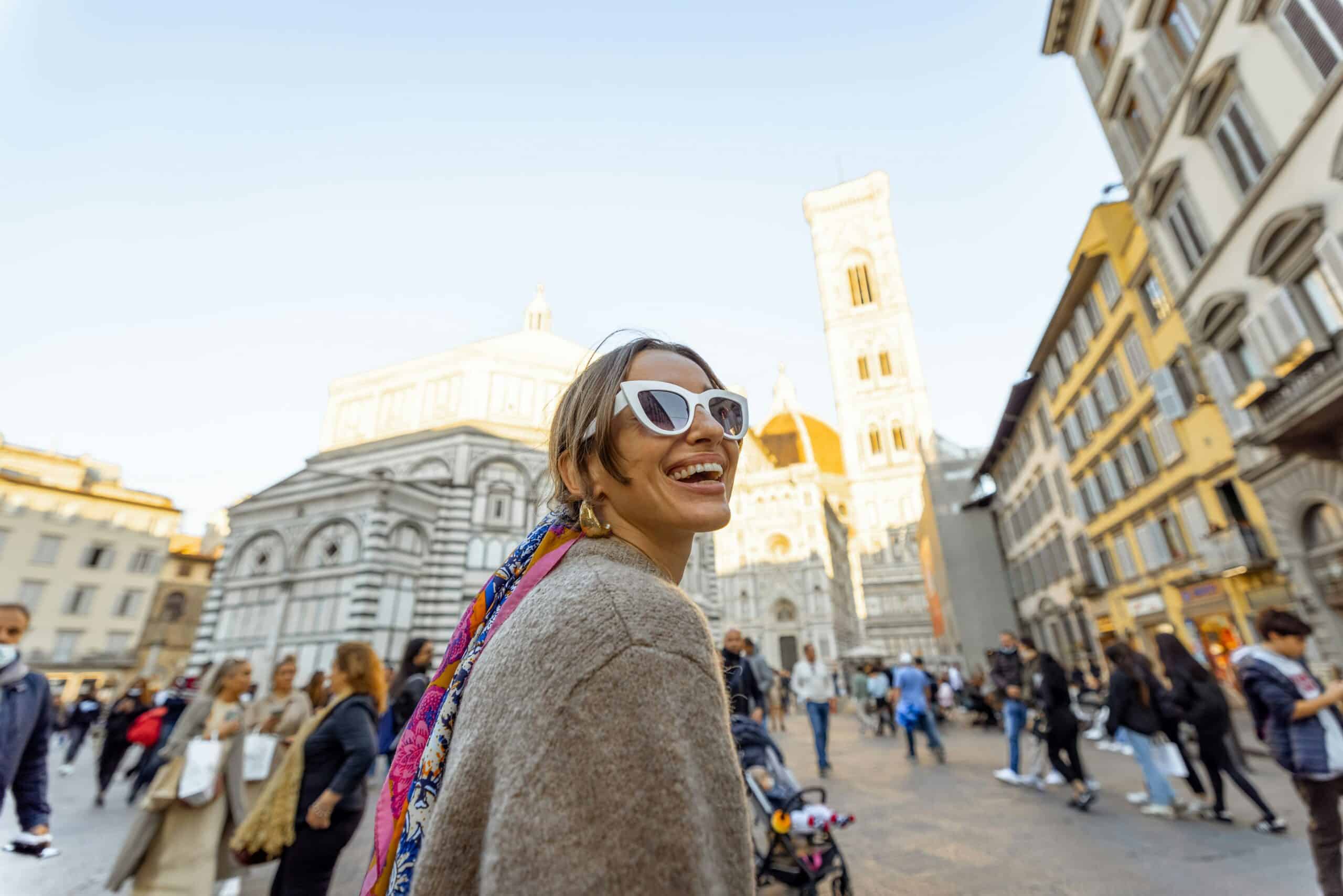 woman smiling in Rome, vacation fundraising, fundraising ideas, charity ideas, silent auction items, travel fundraising events