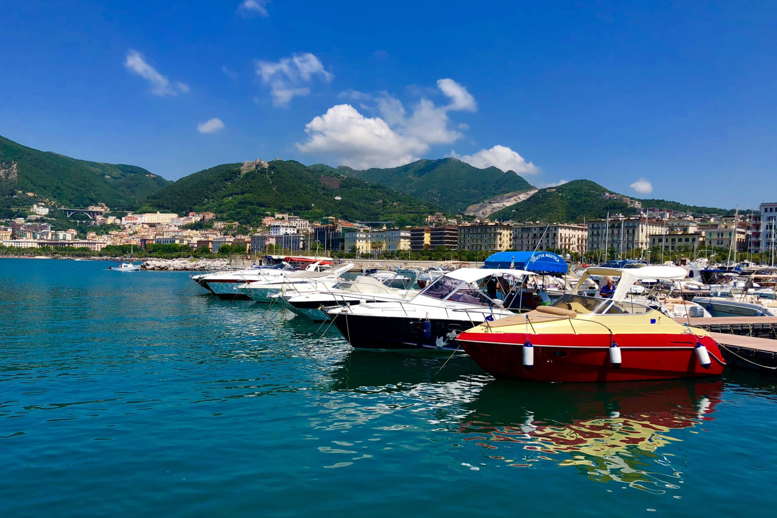 Boats by Sicily beach, charity auction travel packages, vacation fundraising, travel fundraising, fundraising ideas, charity ideas, silent auction items, travel fundraising events