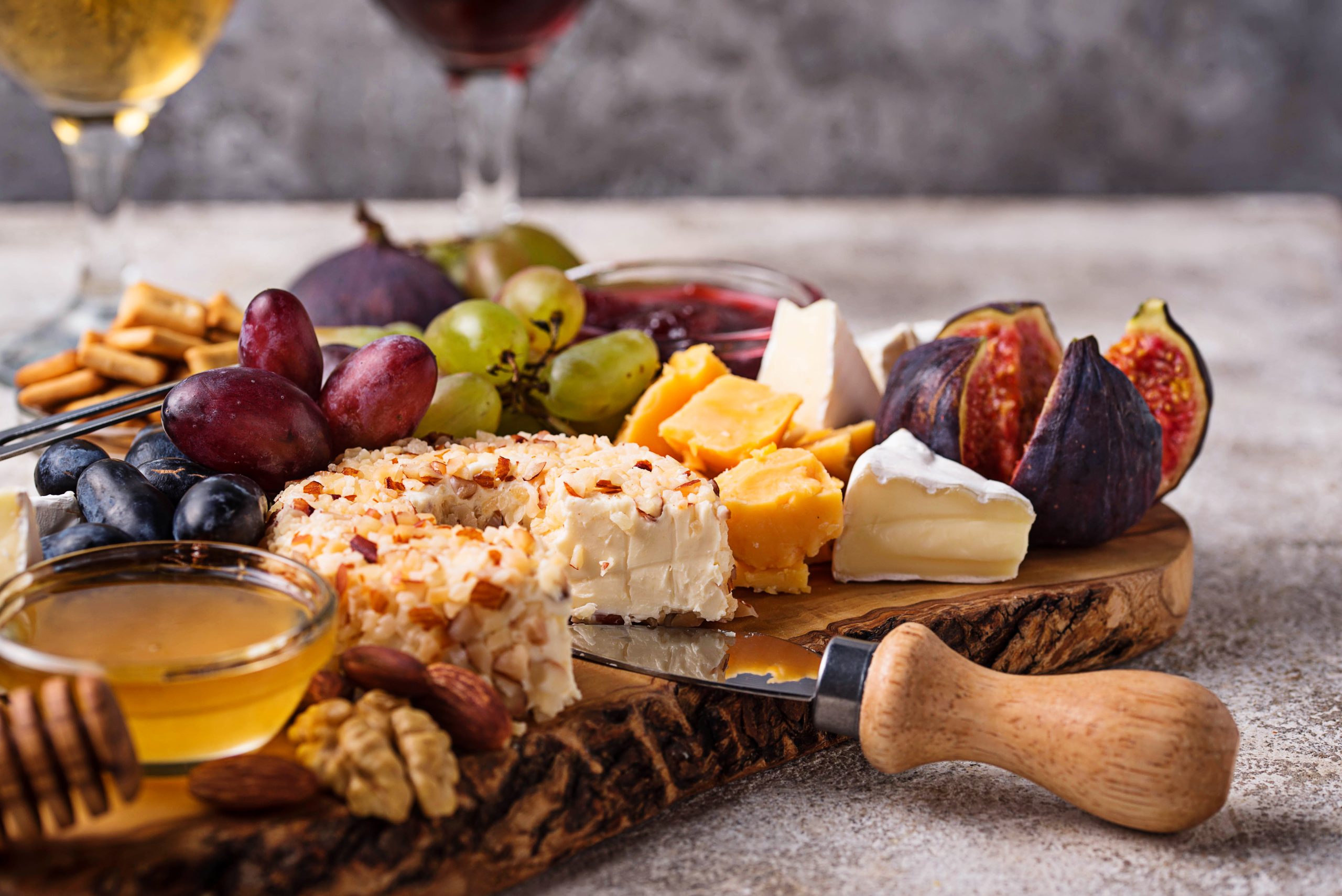 Cheese plate with grapes and figs, consignment travel providers, charity auction travel packages, vacation fundraising, travel fundraising, fundraising ideas, charity ideas, silent auction items, travel fundraising events