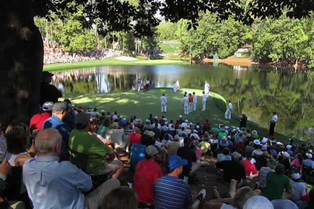 people golfing at the Masters next to lake, consignment travel providers, charity auction travel packages, vacation fundraising, travel fundraising, fundraising ideas, charity ideas, silent auction items, travel fundraising events
