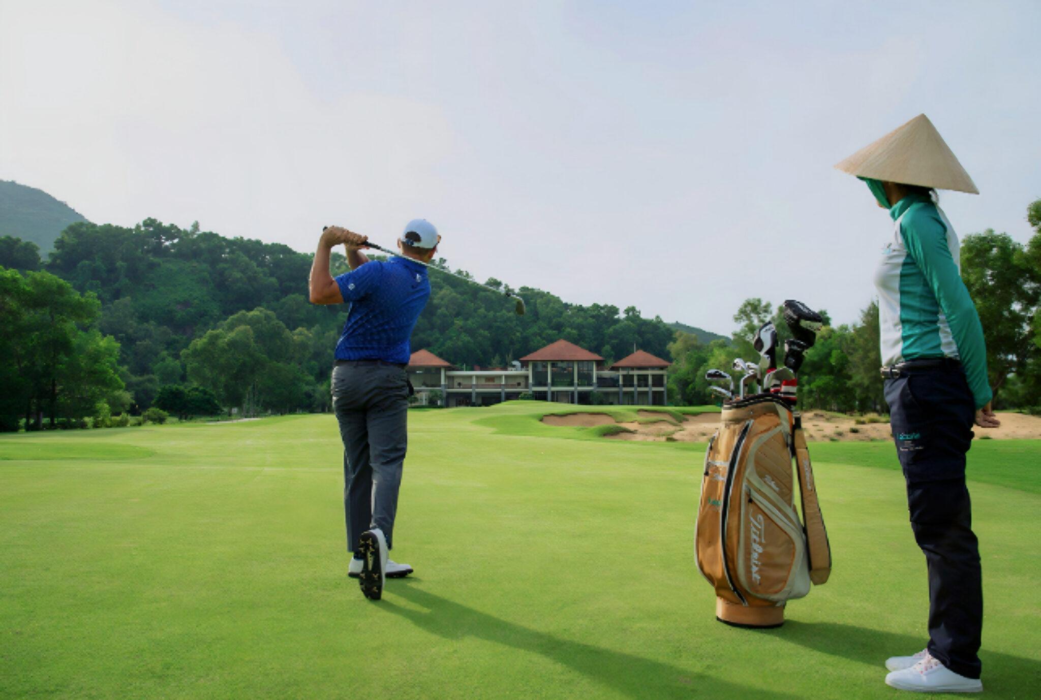 two people playing golf on Vietnam golf course, charity auction travel packages, vacation fundraising, travel fundraising, fundraising ideas, charity ideas, silent auction items, travel fundraising events