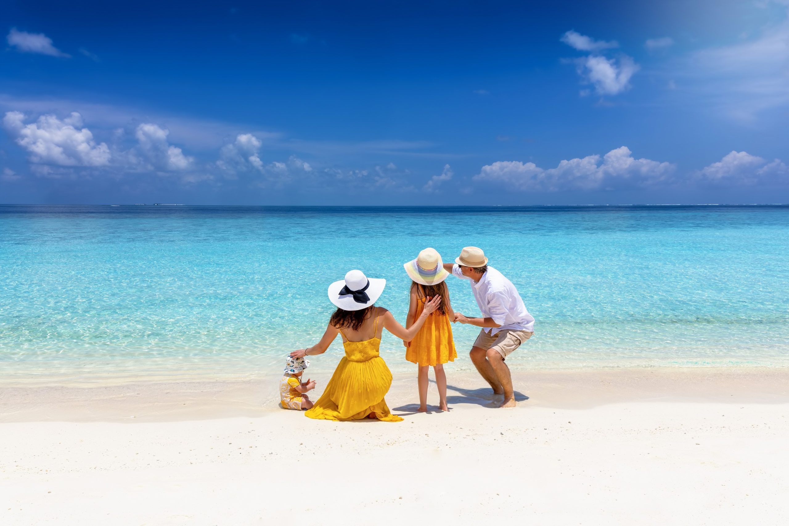 family on beach, consignment travel providers, charity auction travel packages, vacation fundraising, travel fundraising, fundraising ideas, charity ideas, silent auction items, travel fundraising events